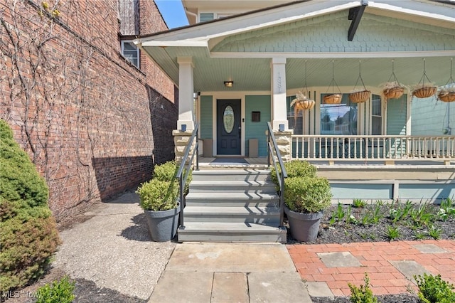 1881 W 65th St, Cleveland, OH 44102 - entrance to property featuring a porch and brick siding