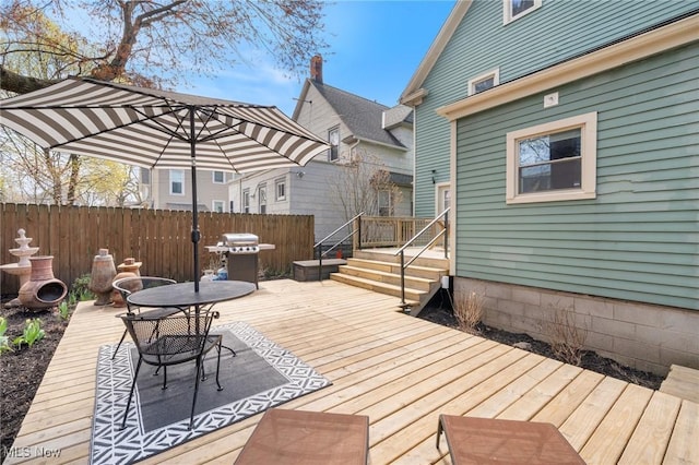 1881 W 65th St, Cleveland, OH 44102 - wooden deck featuring area for grilling and outdoor dining area