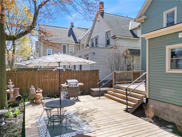 1881 W 65th St, Cleveland, OH 44102 - wooden terrace with area for grilling and a patio