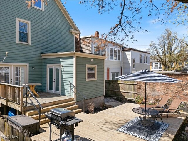 1881 W 65th St, Cleveland, OH 44102 - back of house with french doors, a deck, and a chimney