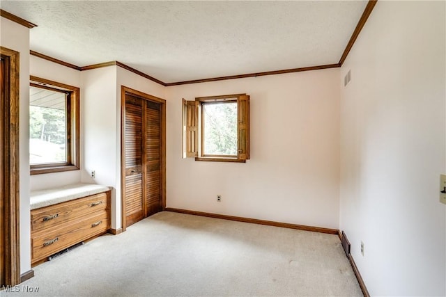 1809 Heritage Cir, Dover, OH 44622 - unfurnished bedroom with light colored carpet, ornamental molding, and multiple windows