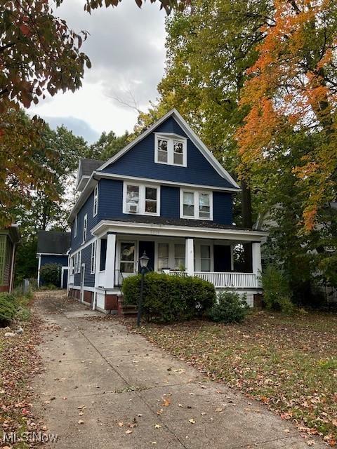3218 Hyde Park Ave, Cleveland Heights, OH 44118 - american foursquare style home featuring driveway and a porch