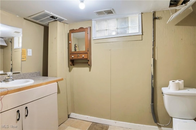 3533 Carlyle Ave, Cleveland, OH 44109 - bathroom featuring visible vents, toilet, and vanity