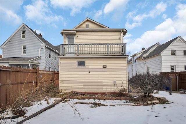 3533 Carlyle Ave, Cleveland, OH 44109 - snow covered property featuring fence and a balcony