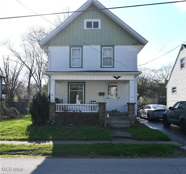 traditional style home with covered porch