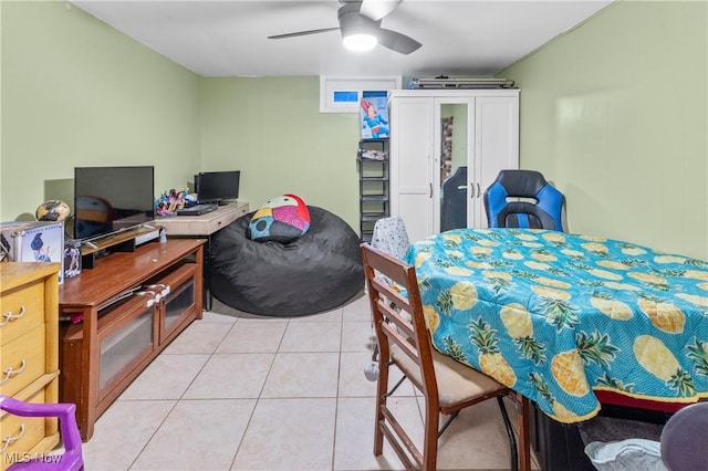 bedroom featuring ceiling fan and light tile patterned flooring
