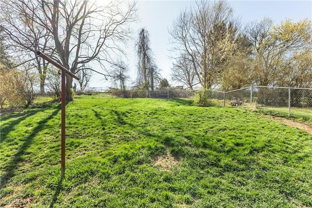 view of yard with fence