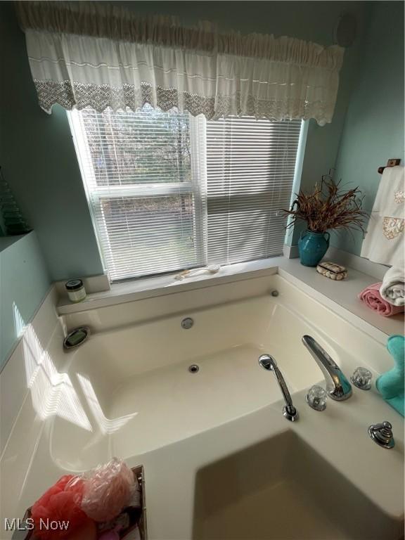 bathroom with a bath