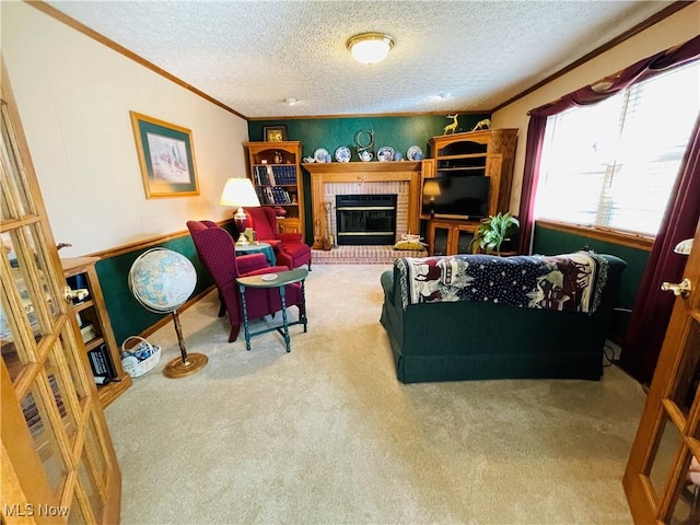 living room with carpet floors, crown molding, a brick fireplace, and a textured ceiling