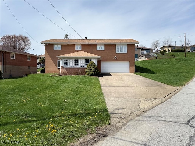view of front facade featuring a garage, driveway, a front lawn, and brick siding