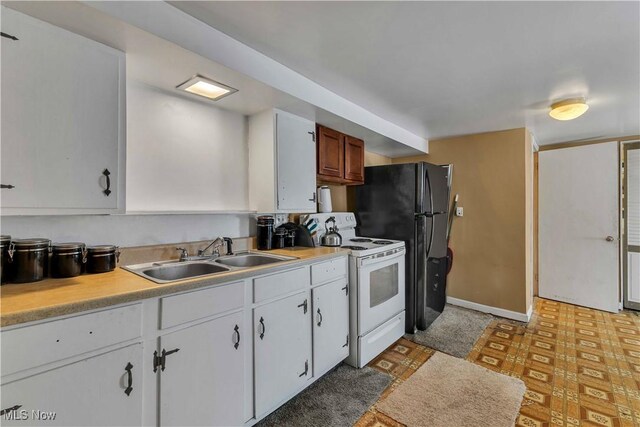 kitchen with a sink, baseboards, light floors, light countertops, and white range with electric cooktop