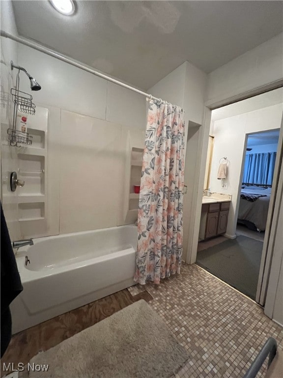 ensuite bathroom with shower / tub combo with curtain and ensuite bathroom