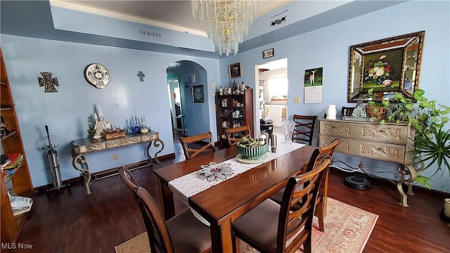 59011 Cherry Hill Rd, Byesville, OH 43723 - dining space with arched walkways, wood finished floors, and a chandelier