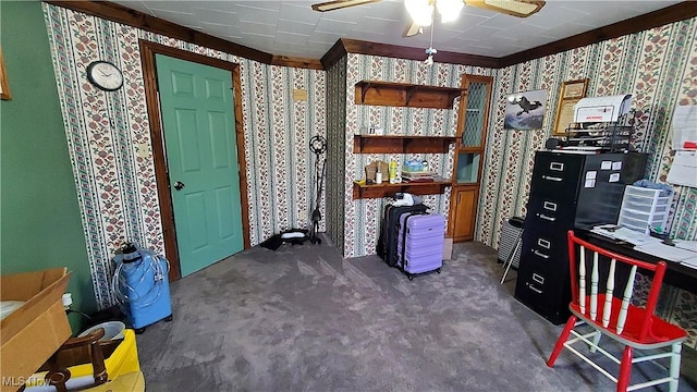 59011 Cherry Hill Rd, Byesville, OH 43723 - miscellaneous room featuring wallpapered walls, an office area, a ceiling fan, and dark colored carpet