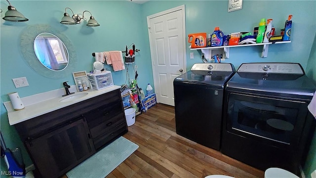 59011 Cherry Hill Rd, Byesville, OH 43723 - laundry room with washer and dryer and dark wood-type flooring