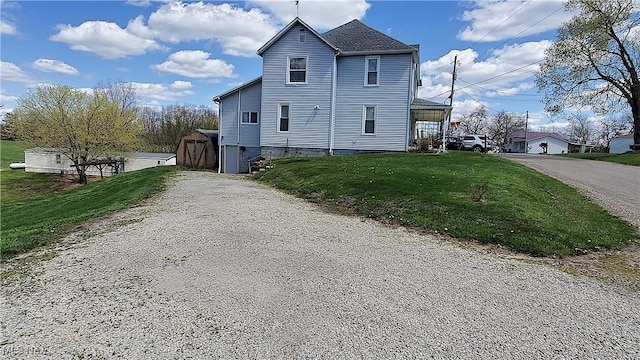 59011 Cherry Hill Rd, Byesville, OH 43723 - view of home's exterior with driveway and a lawn