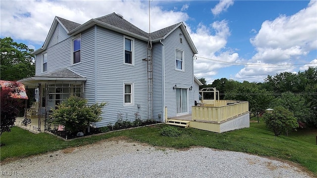 59011 Cherry Hill Rd, Byesville, OH 43723 - view of side of property with a deck, a shingled roof, and a yard