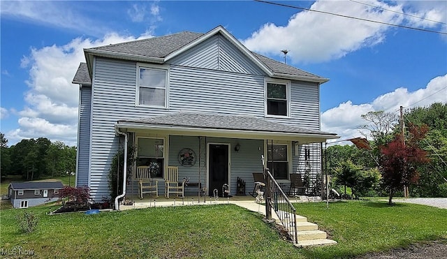 59011 Cherry Hill Rd, Byesville, OH 43723 - traditional home with a front yard, a porch, and a shingled roof