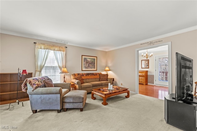 1332 Springbrook Dr, Mansfield, OH 44906 - living area with a chandelier, crown molding, and light carpet