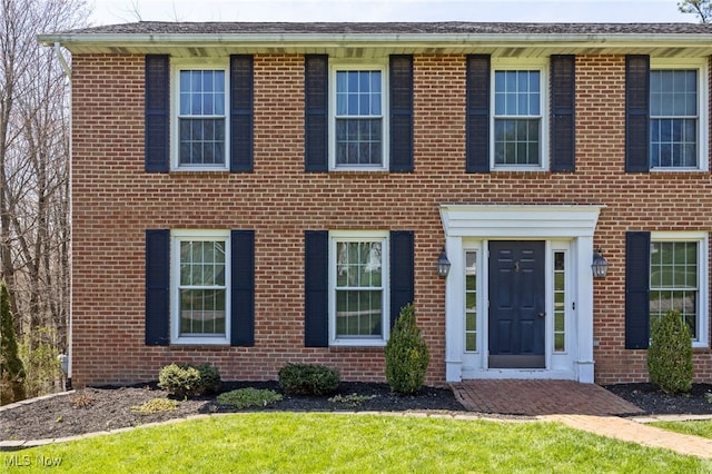 1332 Springbrook Dr, Mansfield, OH 44906 - view of front of house featuring a front lawn and brick siding