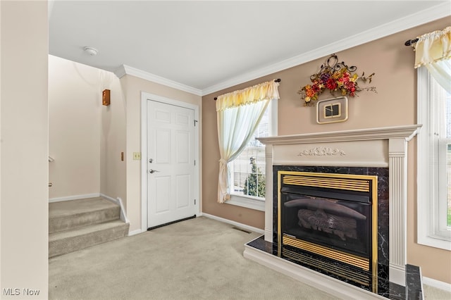 1332 Springbrook Dr, Mansfield, OH 44906 - carpeted living area with baseboards, a fireplace, stairs, and ornamental molding