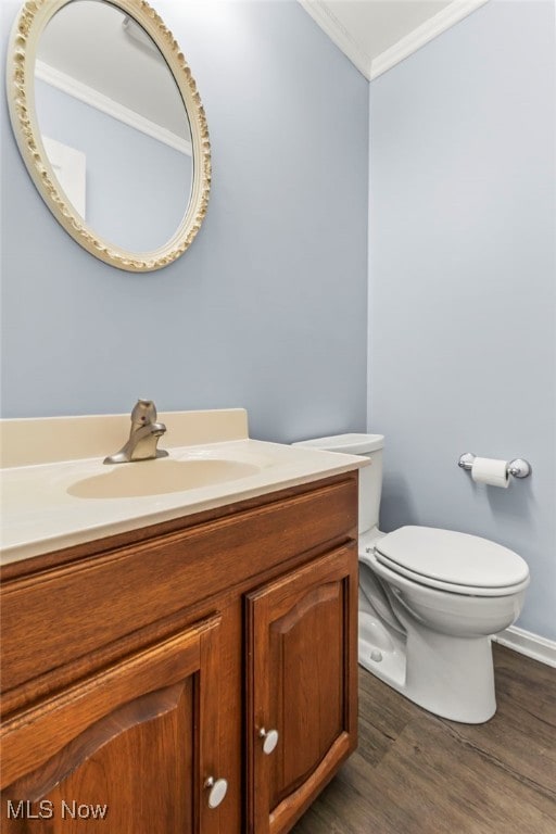 1332 Springbrook Dr, Mansfield, OH 44906 - half bath featuring ornamental molding, vanity, and wood finished floors