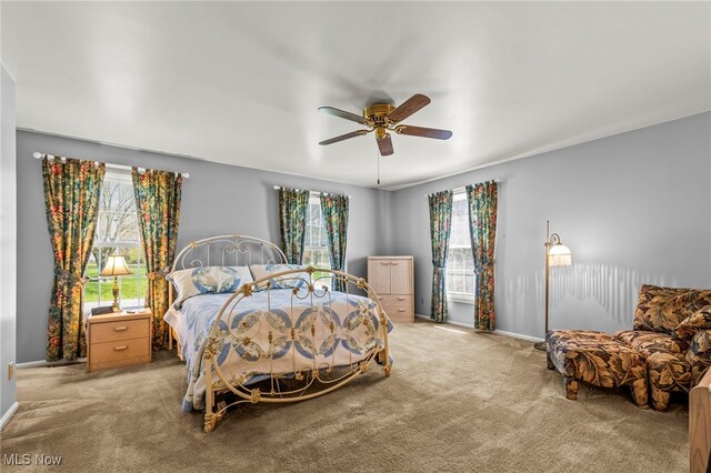 1332 Springbrook Dr, Mansfield, OH 44906 - carpeted bedroom with ceiling fan and baseboards