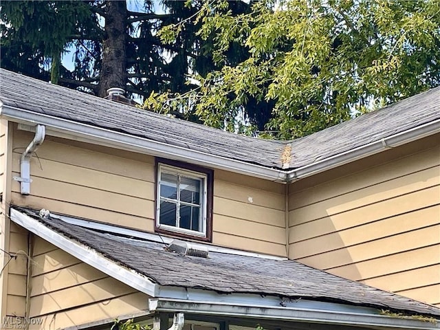 974 Madison Ave, Alliance, OH 44601 - details featuring a downspout, gutters, and roof with shingles