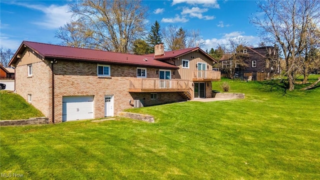 3604 Eldersville Rd, Colliers, WV 26035 - back of property with a wooden deck, a yard, and a garage
