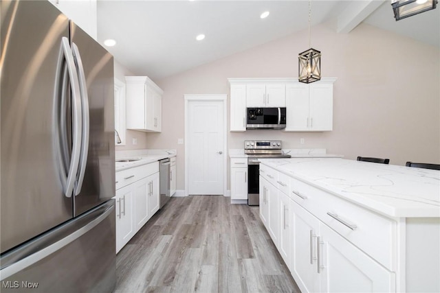 3604 Eldersville Rd, Colliers, WV 26035 - kitchen with white cabinets, stainless steel appliances, vaulted ceiling with beams, and light wood-style flooring