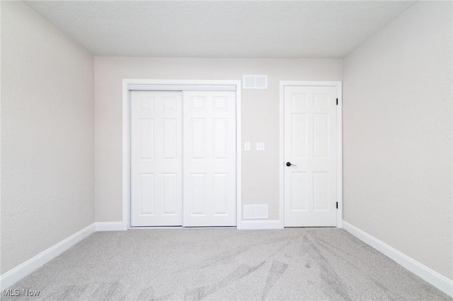 3604 Eldersville Rd, Colliers, WV 26035 - unfurnished bedroom featuring a closet, visible vents, carpet flooring, and baseboards