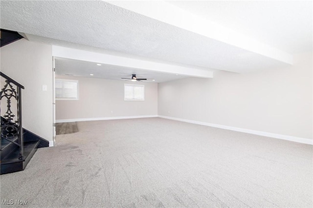 3604 Eldersville Rd, Colliers, WV 26035 - below grade area with ceiling fan, carpet floors, baseboards, and stairway