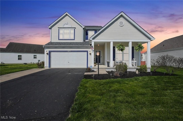 view of front of property with aphalt driveway, a shingled roof, a porch, a front yard, and a garage