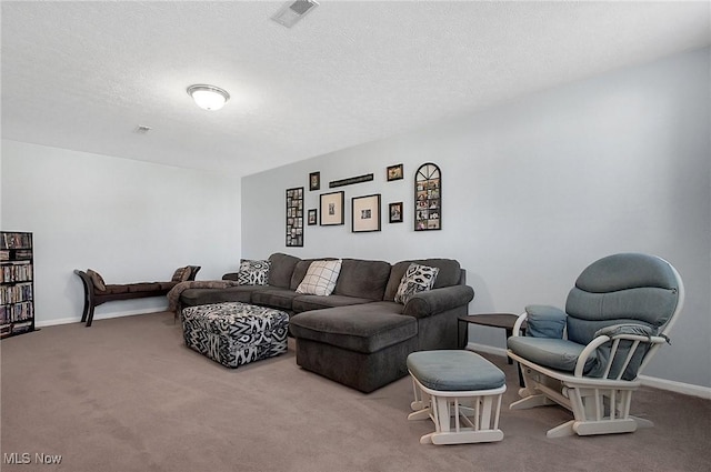 living room with baseboards, visible vents, and carpet