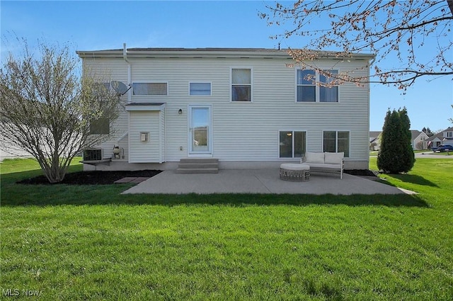 back of property featuring central AC unit, outdoor lounge area, entry steps, a lawn, and a patio