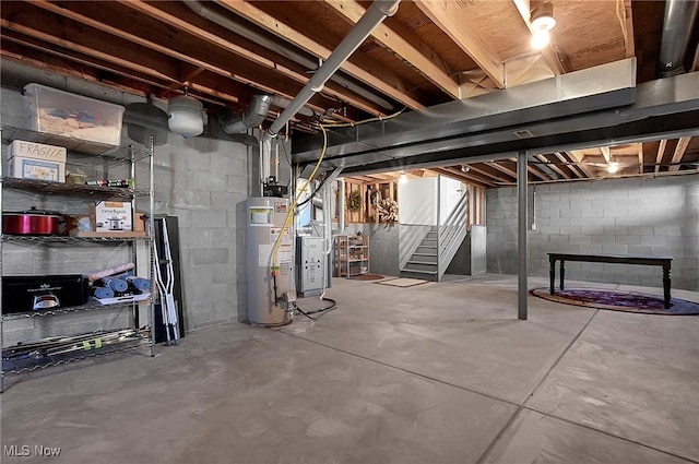 unfinished below grade area with water heater and stairs