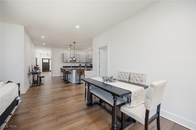 1804 28th St, Vienna, WV 26105 - dining space featuring baseboards, wood finished floors, and recessed lighting