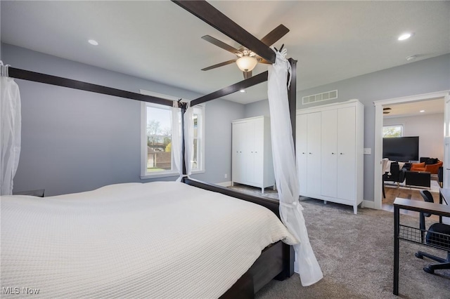 1804 28th St, Vienna, WV 26105 - bedroom with carpet flooring, visible vents, recessed lighting, ceiling fan, and multiple closets
