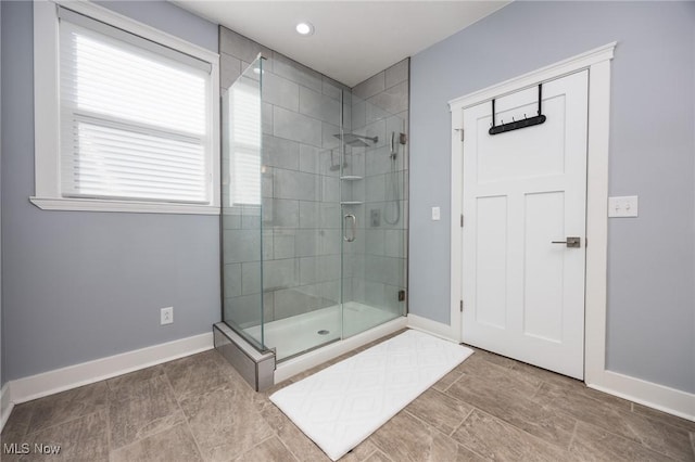 1804 28th St, Vienna, WV 26105 - bathroom featuring a shower stall and baseboards