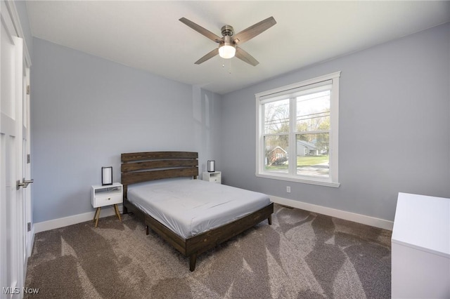 1804 28th St, Vienna, WV 26105 - carpeted bedroom with ceiling fan and baseboards