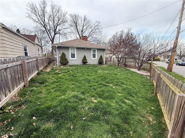 view of yard featuring a fenced backyard
