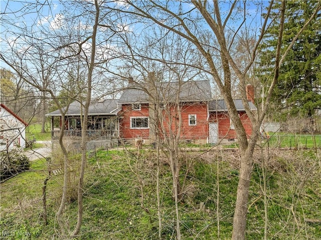 1611 Township Road 1610, Ashland, OH 44805 - back of property with roof with shingles and a chimney