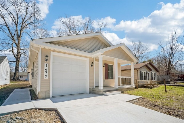 502 Fairlawn Ave, Painesville, OH 44077 - single story home featuring an attached garage, covered porch, and concrete driveway