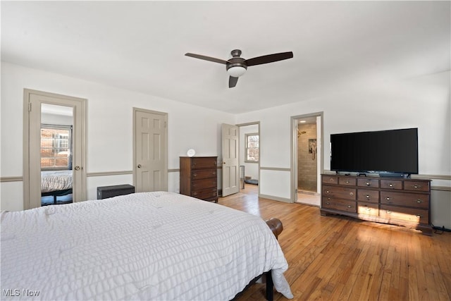 14221 S Woodland Rd, Shaker Heights, OH 44120 - bedroom featuring ceiling fan, connected bathroom, and light wood finished floors