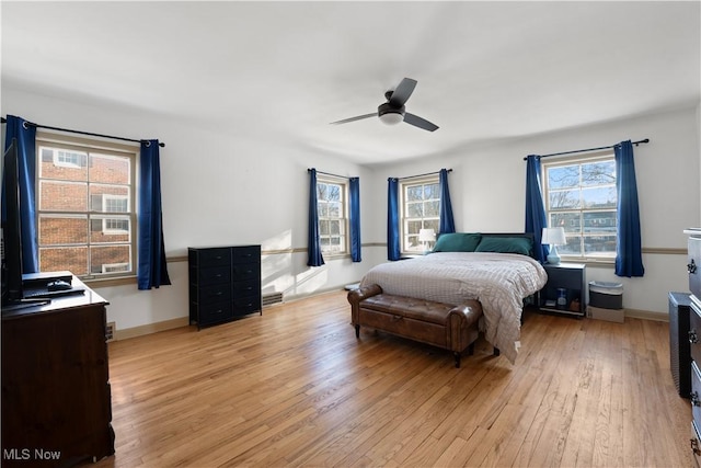 14221 S Woodland Rd, Shaker Heights, OH 44120 - bedroom featuring light wood-type flooring, a ceiling fan, and baseboards