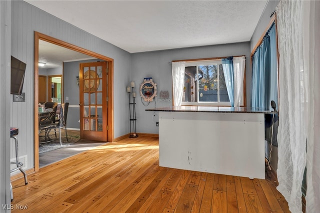 7687 Galena St NW, Massillon, OH 44646 - empty room featuring light wood-style flooring and baseboards
