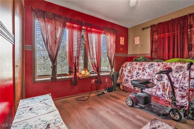 bedroom with wood finished floors