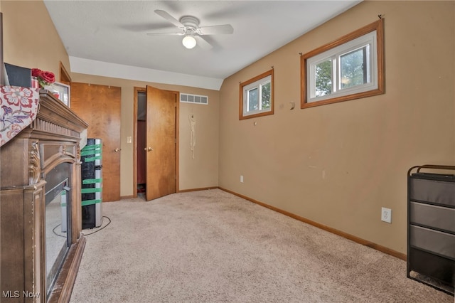 7687 Galena St NW, Massillon, OH 44646 - below grade area with a ceiling fan, carpet, and baseboards
