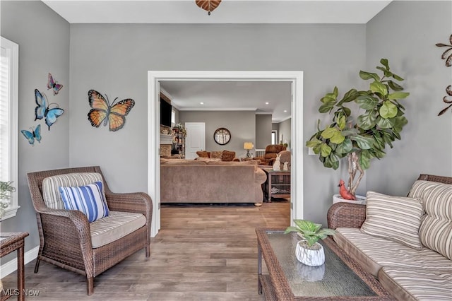 sitting room with recessed lighting and light wood-type flooring