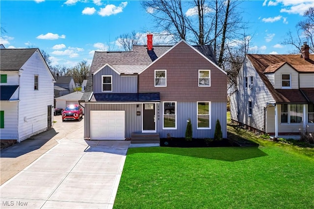 traditional-style house with board and batten siding, a front lawn, driveway, and roof with shingles